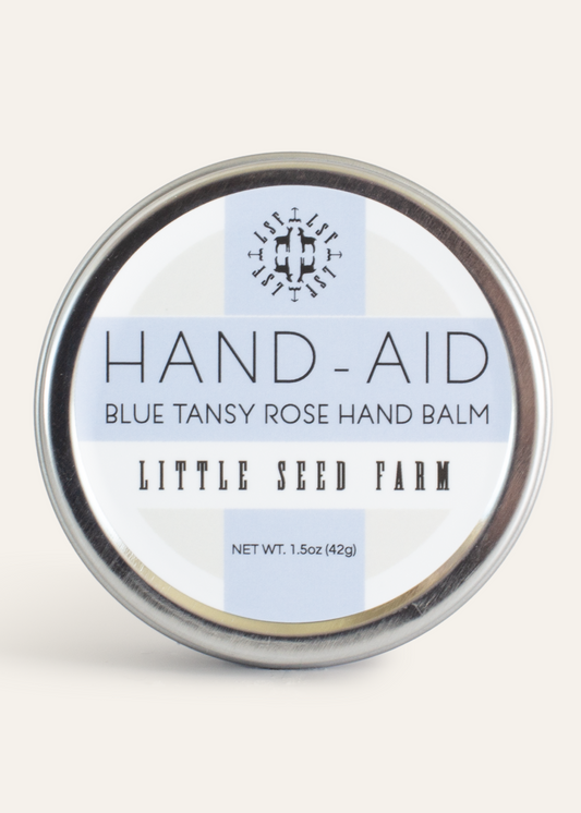 Blue Tansy Rose Hand Aid