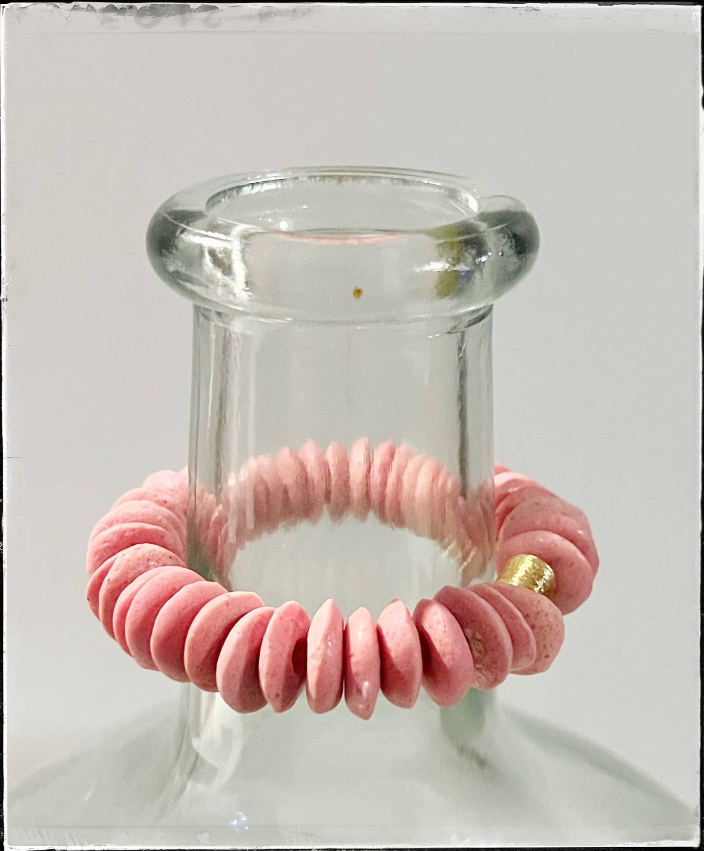 Pink Ashanti Glass Bead Stretch Bracelet Brass Charm Gold