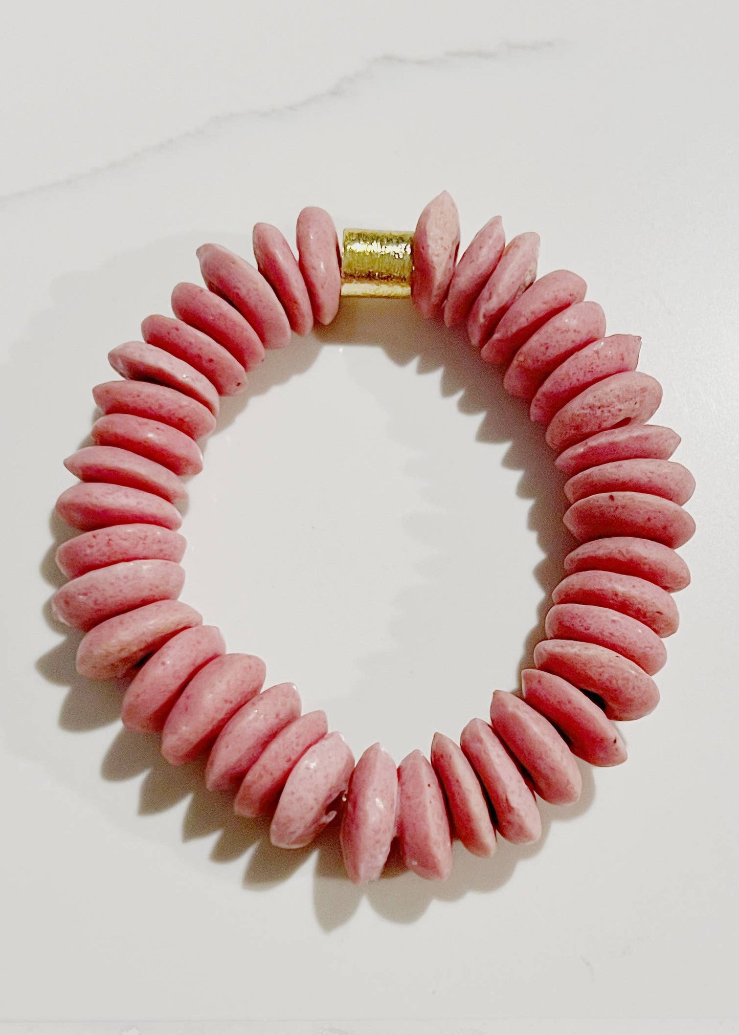 Pink Ashanti Glass Bead Stretch Bracelet Brass Charm Gold