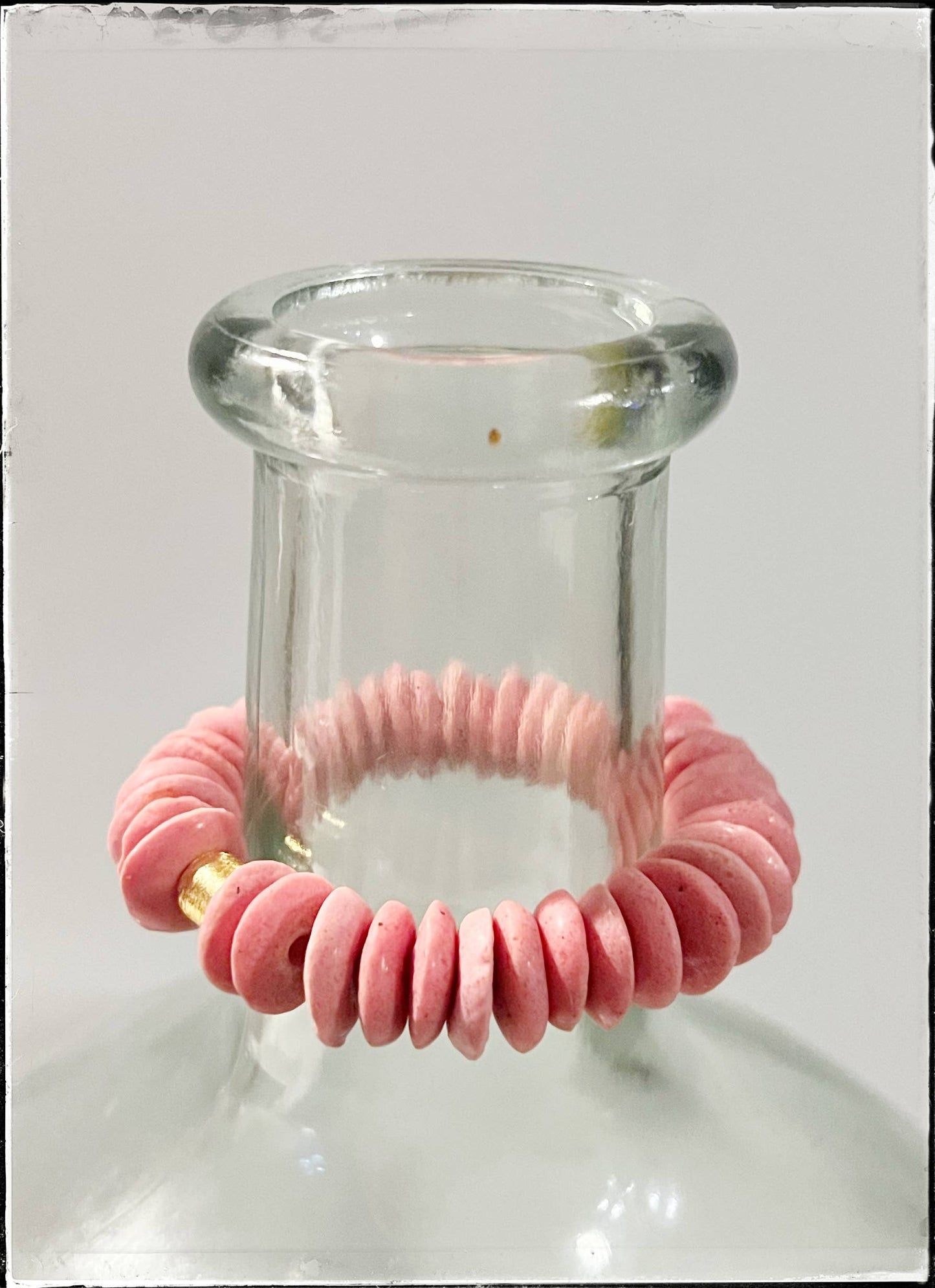 Pink Ashanti Glass Bead Stretch Bracelet Brass Charm Gold